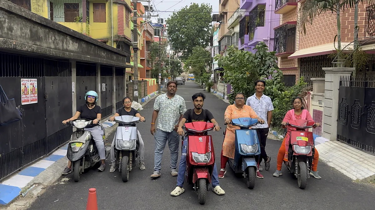 Zero Fear learners on their scooties with their trainers